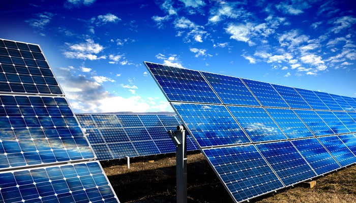 solar-panels-modules-and-blue-sky-with-clouds